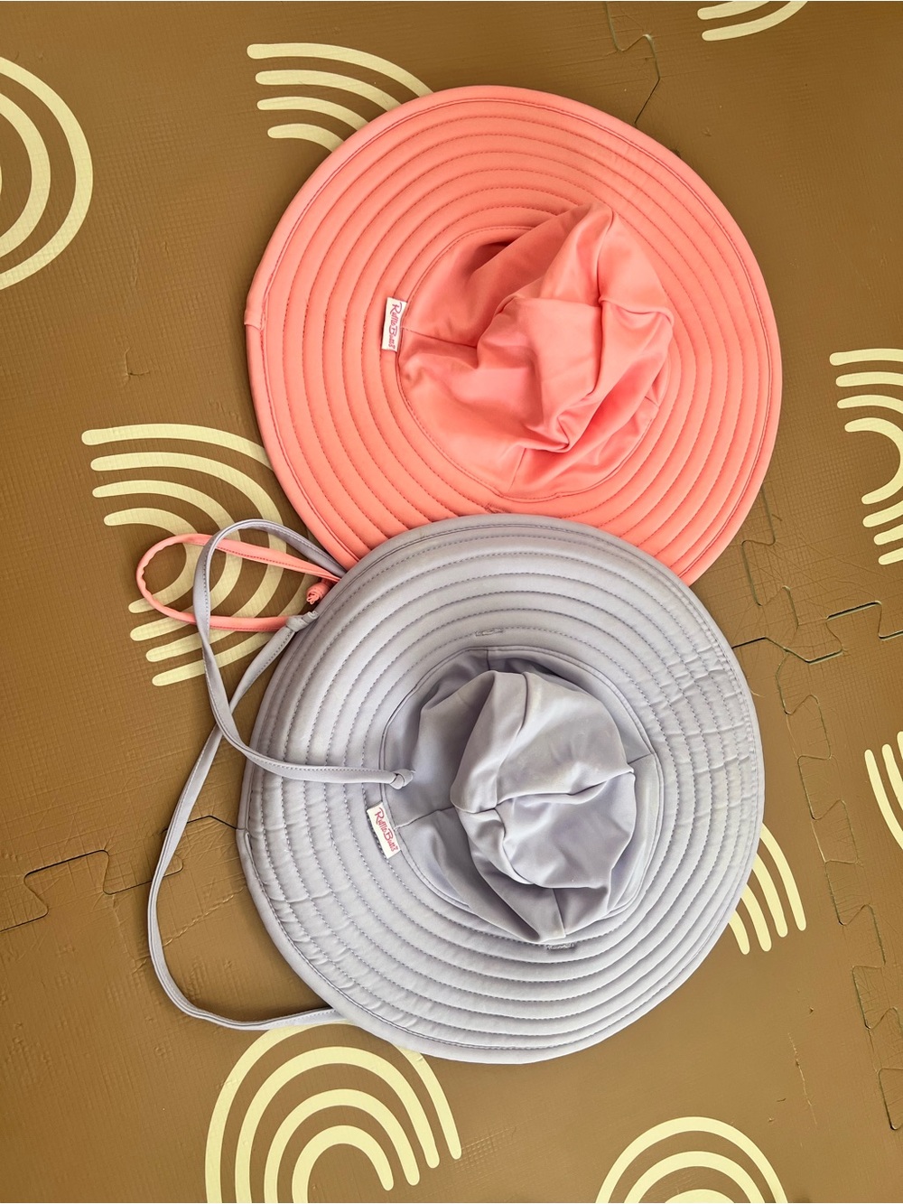Ruffle Butts Coral and lavender sun or beach hat.